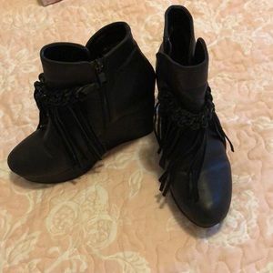 Black ankle boots with leather fringe
